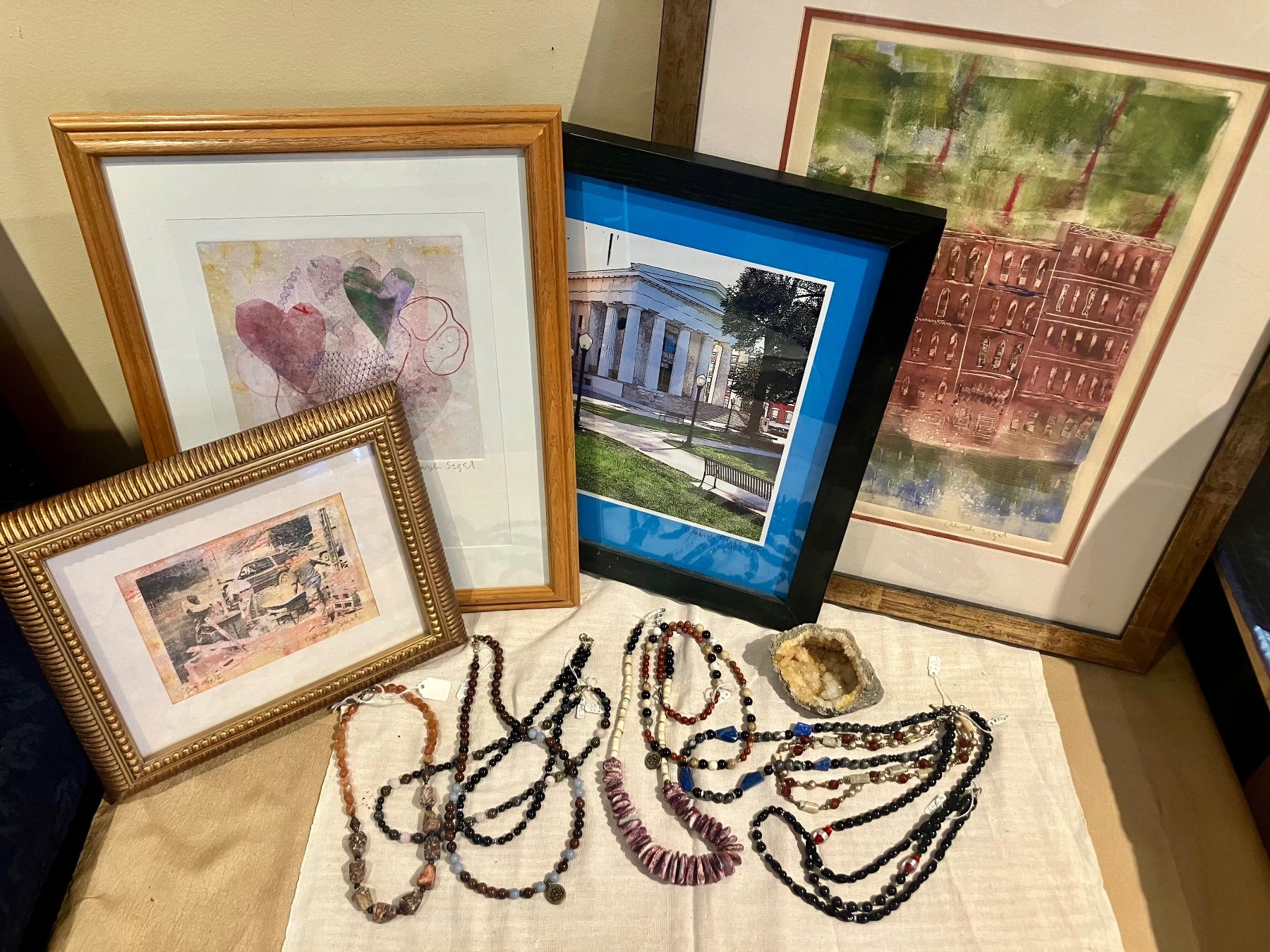 Local artwork and handmade jewelry on display at Segel Violins